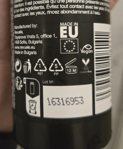 A shampoo bottle with a logo of EU flag and the text "Made in EU" above it on its back.