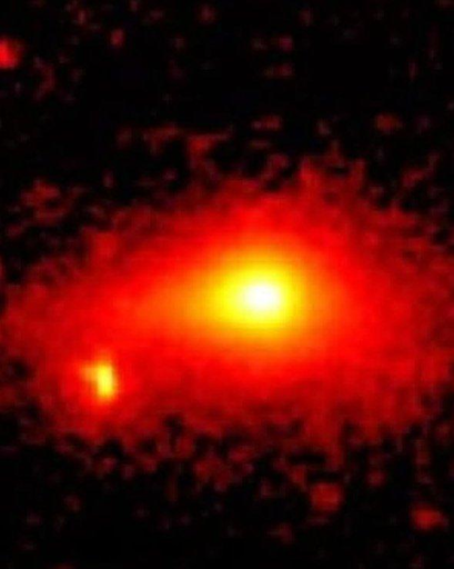 Osservazioni infrarosse SPHEREx della chioma in eruzione di 3I/ATLAS, dicembre 2025.