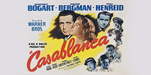 Manifesto a colori che pubblicizza il film "Casablanca", ritrae i due protagonisti, Bogart e Bergman, circondati da ritratti degli altri interpreti, sopra la scritta in rosso "casablanca"
