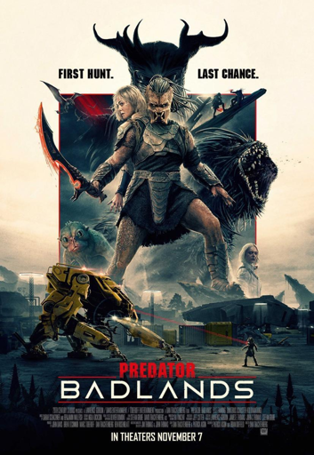 Poster per il film “Predator: Badlands”:
un predator al centro, circondata da creature tra cui un predator con corna e un mostro con denti affilati. Sotto, il testo “PRIMA CACCIA. ULTIMA CHANCE.”. Sotto la figura centrale, una mecha robotica gialla, una piccola creatura blu, una figura bianca e un veicolo futuristico sono visibili in un paesaggio industriale.
Il titolo “PREDATOR” è in rosso, “BADLANDS” in bianco.